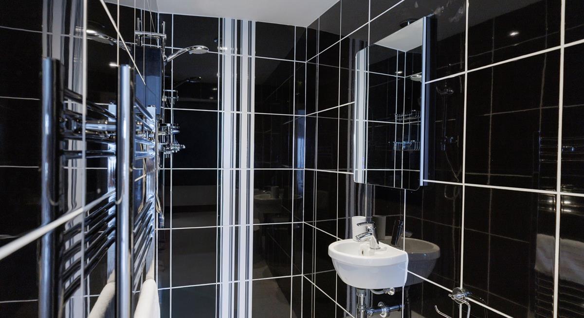 The en suite shower room is a great space to get ready each morning.