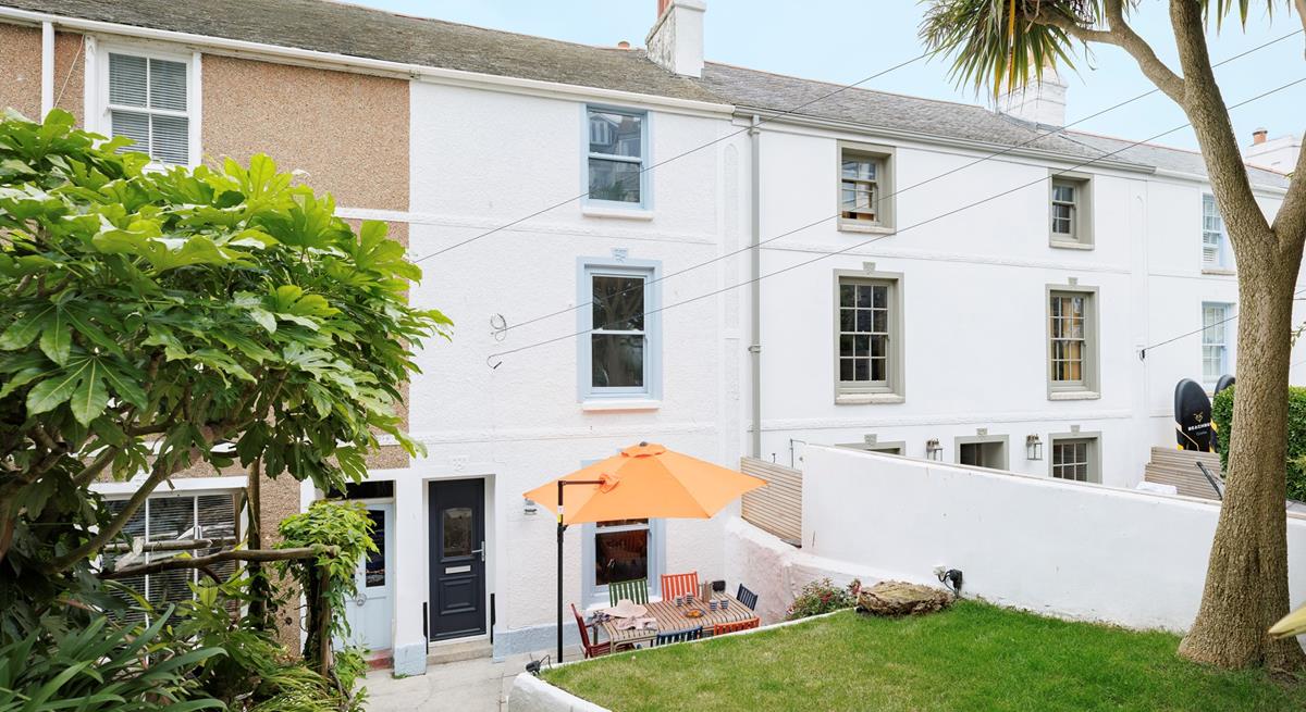 Welcome to Submariners, the sheltered front garden is a perfect suntrap.
