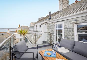 Sip the first coffee of the day and take in the sea view from the roof terrace.