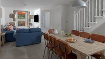 Tastefully decorated, the sitting room is a cosy space to relax and unwind.