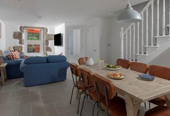 Tastefully decorated, the sitting room is a cosy space to relax and unwind.