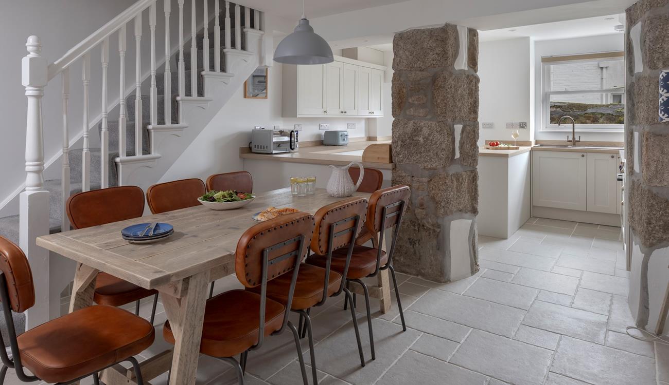 The dining table seats 8 comfortably, ideal for the family to enjoy meals together.