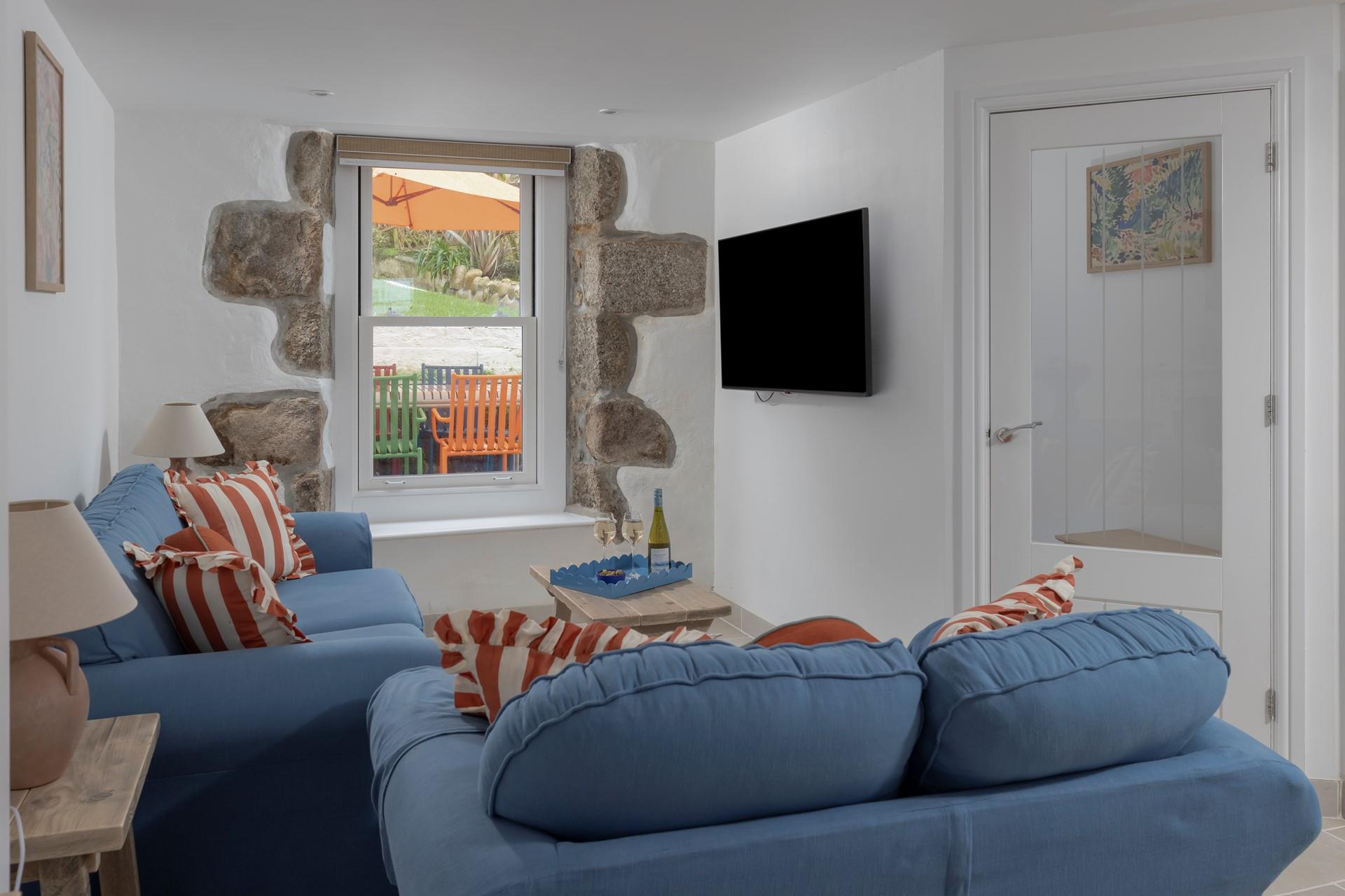 The open plan living space is the ideal cosy base to return to each day.