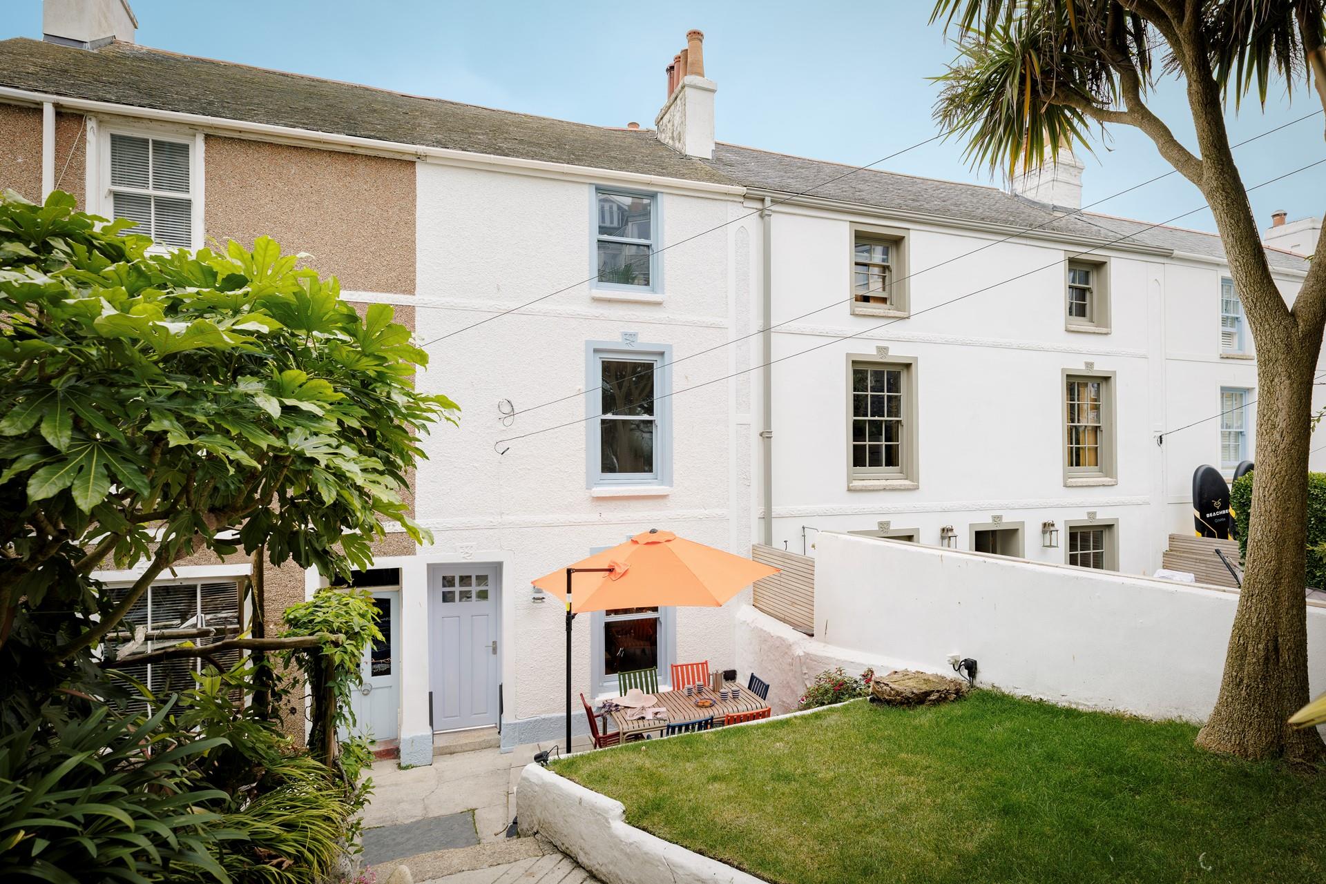 Welcome to Submariners, the sheltered front garden is a perfect suntrap.