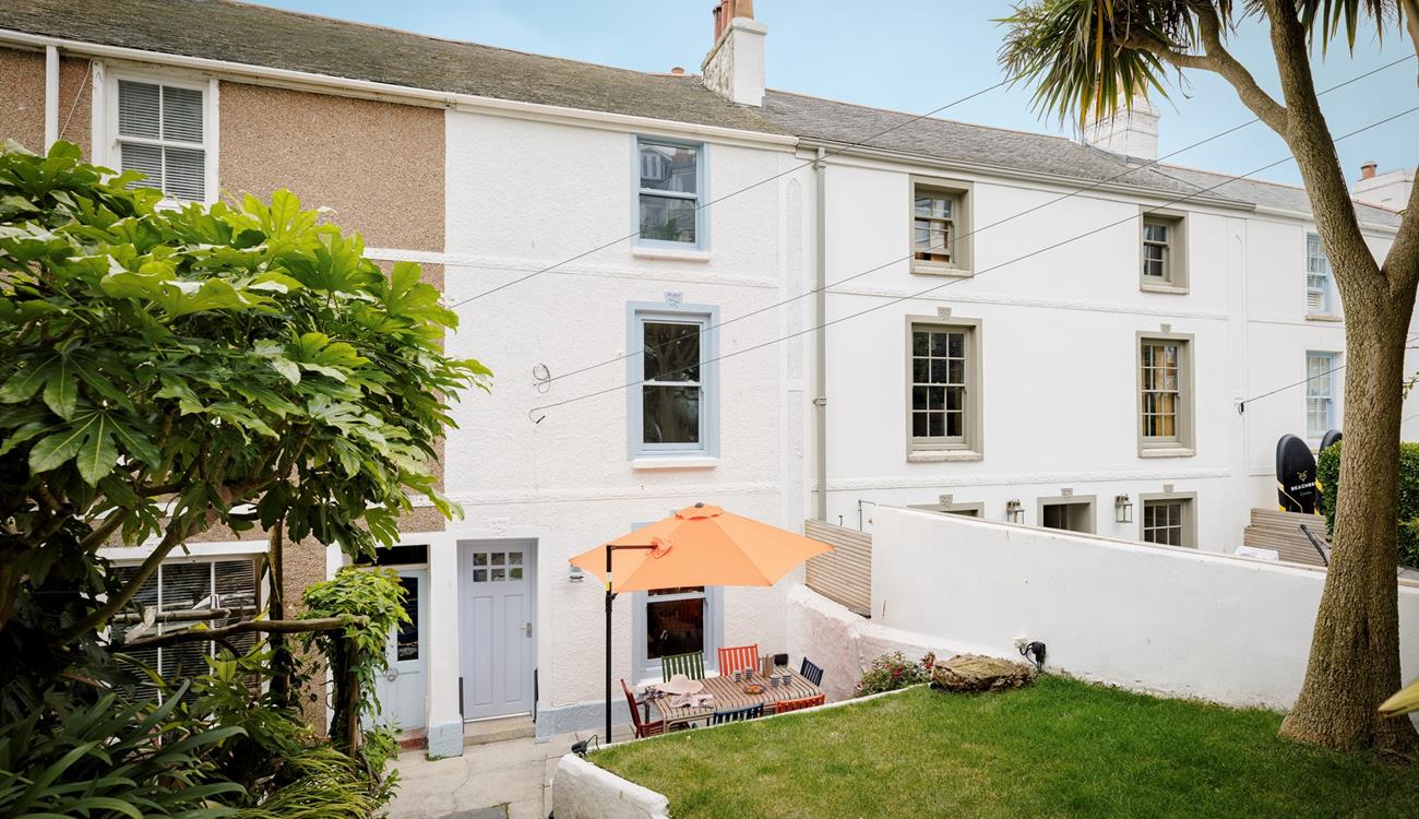 Welcome to Submariners, the sheltered front garden is a perfect suntrap.