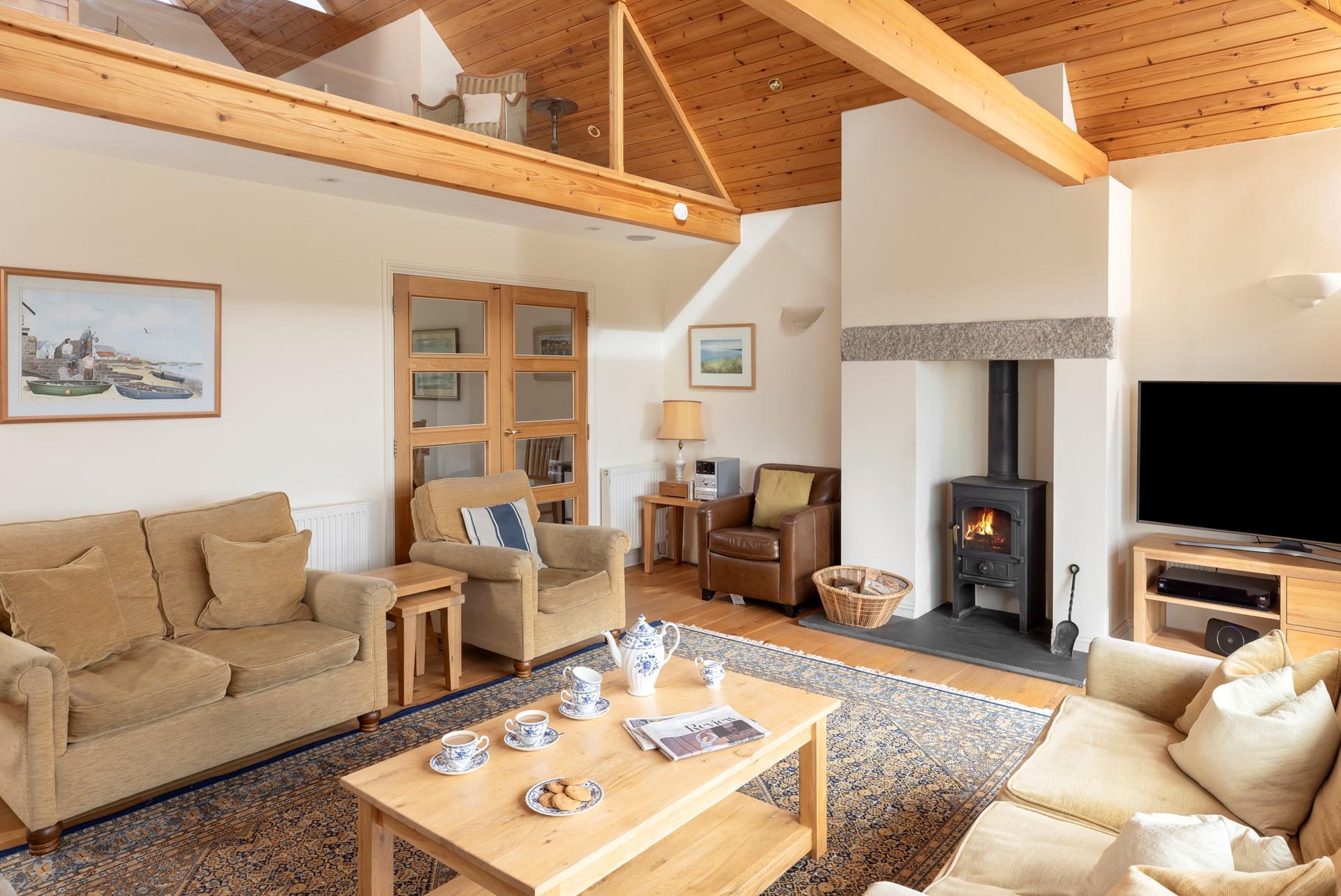 Light the woodburner after a blustery walk by the sea.