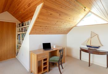 Take a quiet moment to check emails in the snug area.