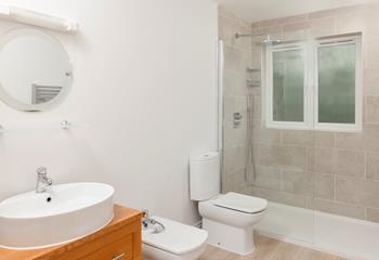 Get ready for the day in the en suite shower room.