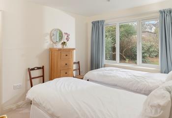 Cosy and inviting, the bedrooms are the perfect place to rest each night.