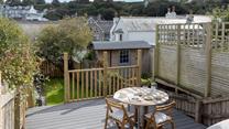 From the sundeck, step onto the enclosed lawn area.