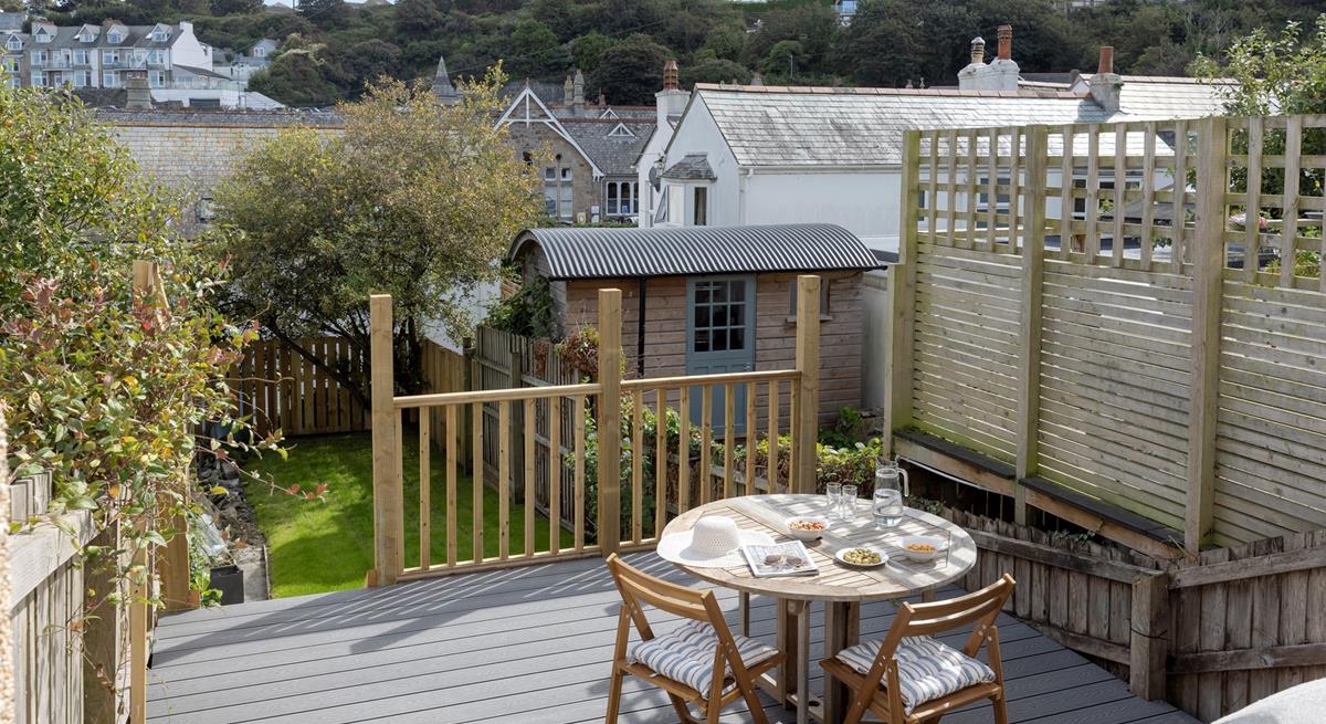 From the sundeck, step onto the enclosed lawn area.