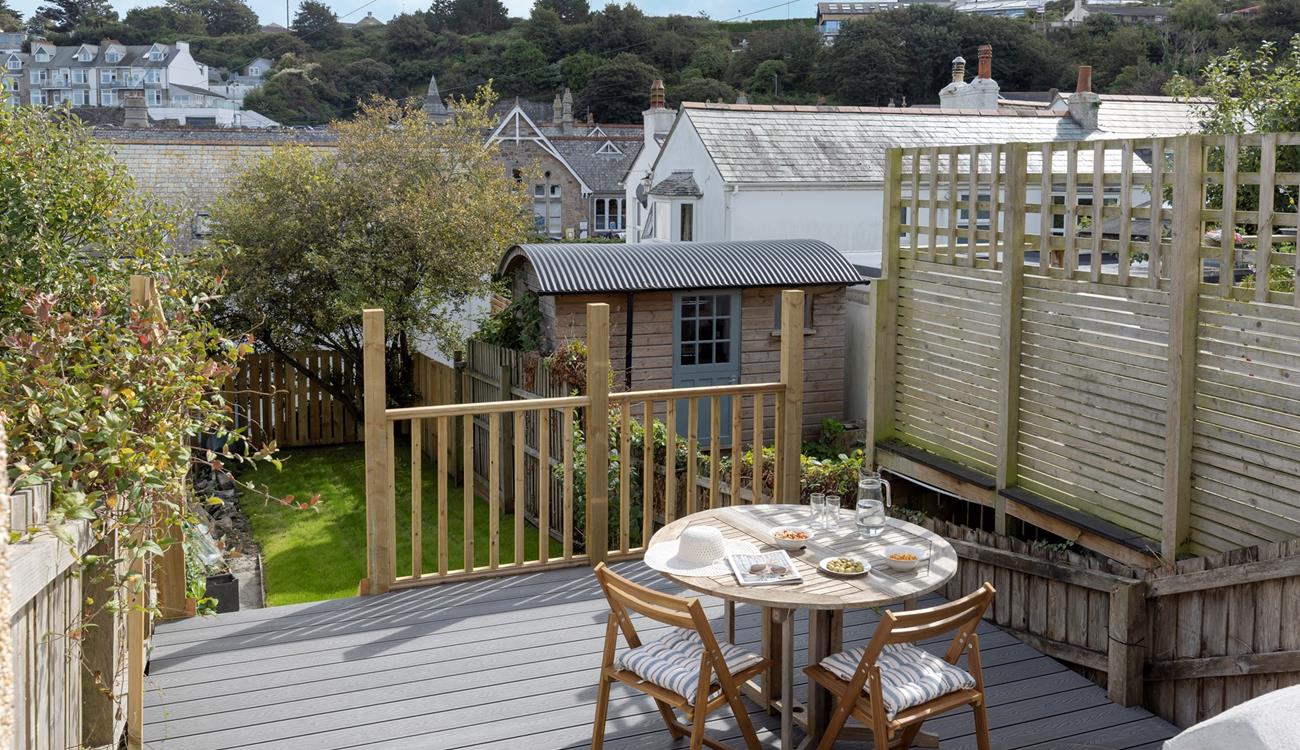 From the sundeck, step onto the enclosed lawn area.