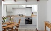 Cook and eat with your loved ones in the stylish kitchen. - Thumbnail Image