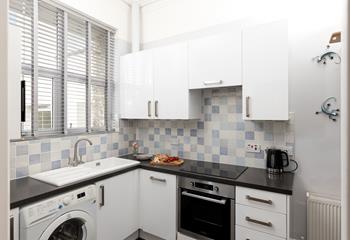 The kitchen is well-equipped for cooking tasty meals.