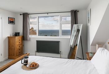 Open the curtains and decide on the day's plans whilst gazing out to sea.