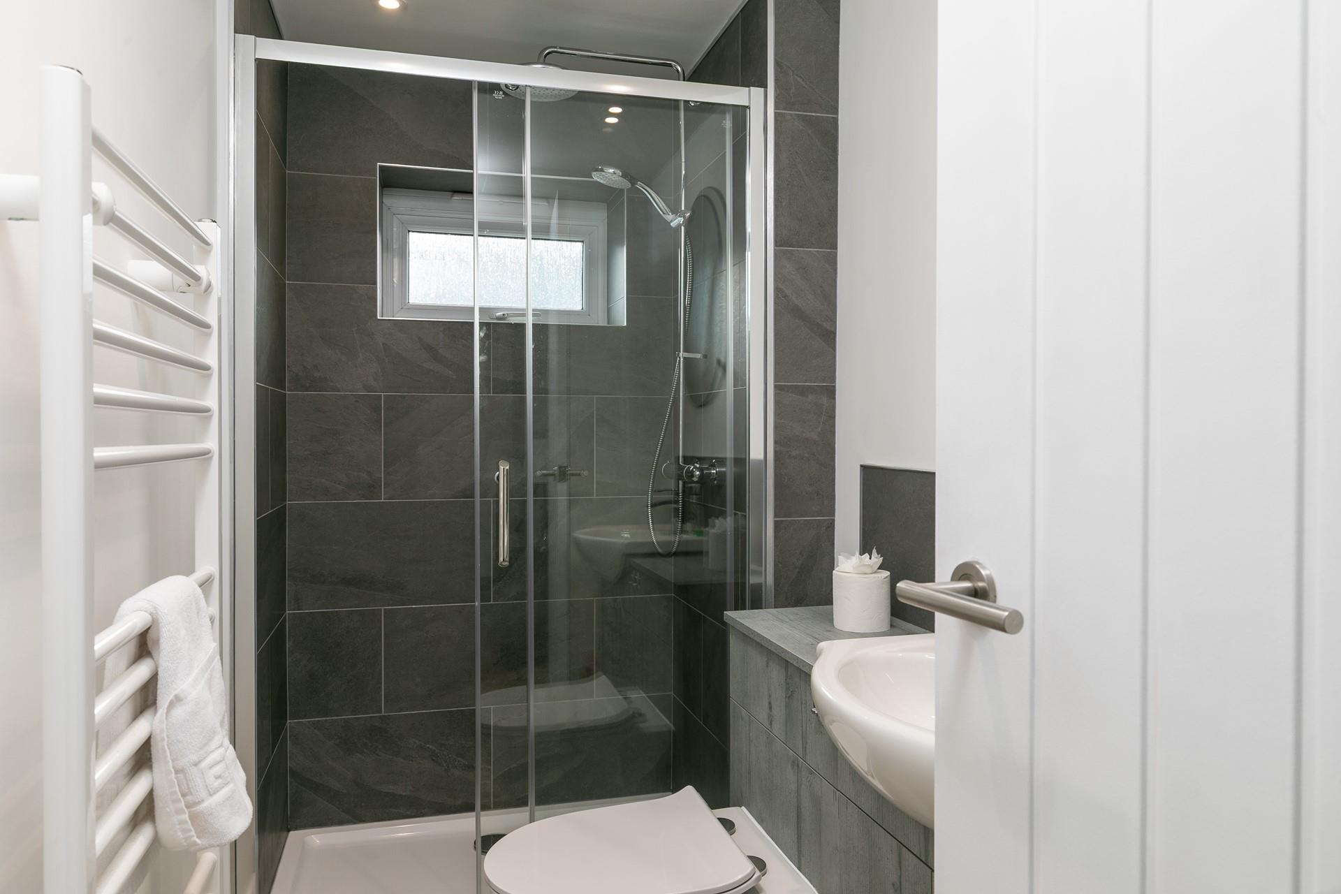 Get ready for the day in the handy en suite.