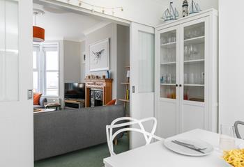 With sliding doors to the sitting room, you can relax and dine together as a family.