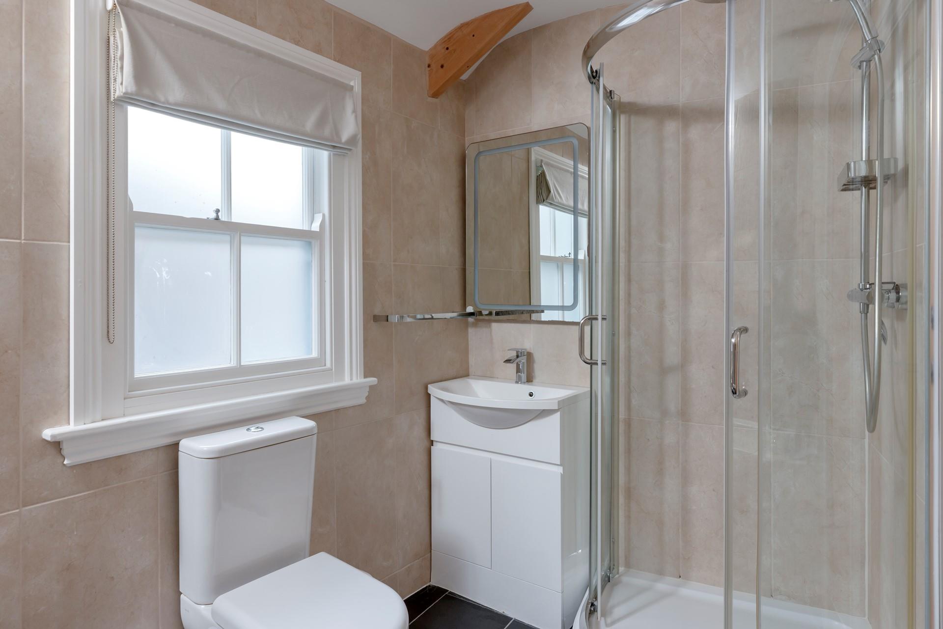 Start the day with a hot shower in the family bathroom.