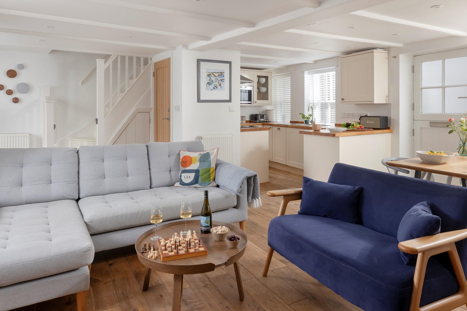 The cosy open plan living area is ideal for nights in.