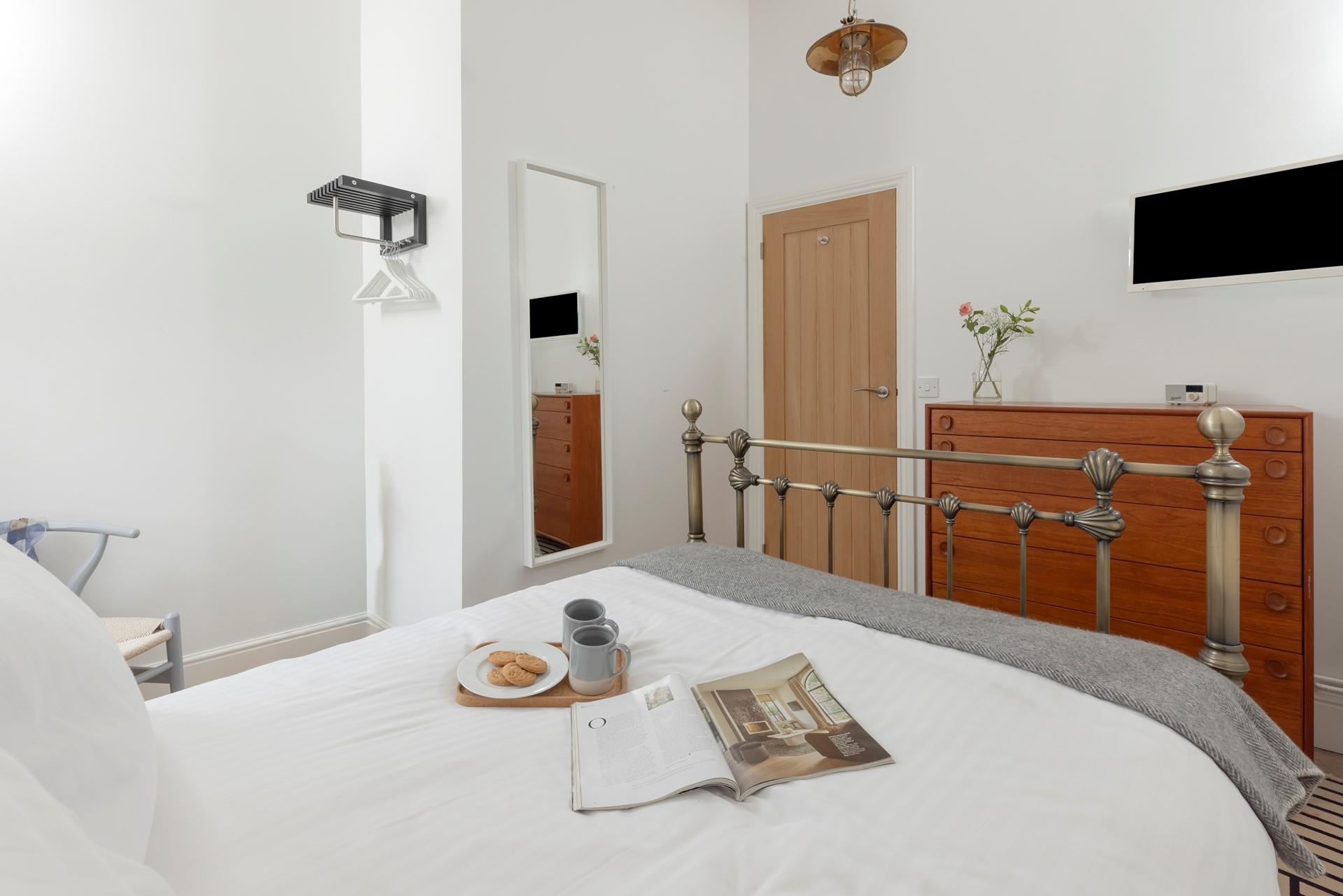 Sip a cup of tea in bed while deciding on your day's agenda.