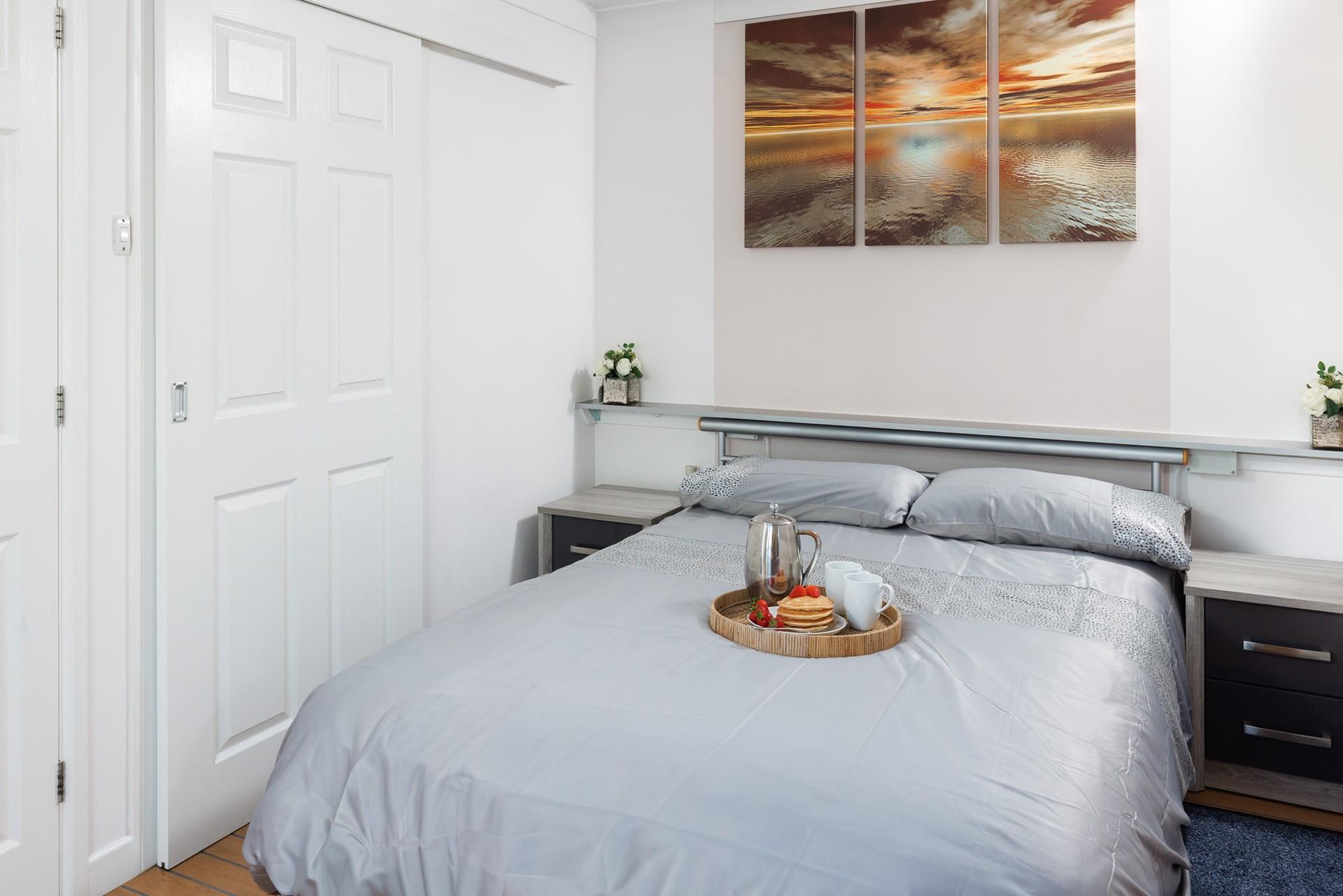 Spend slow mornings sipping coffee in bed before hitting the beach!