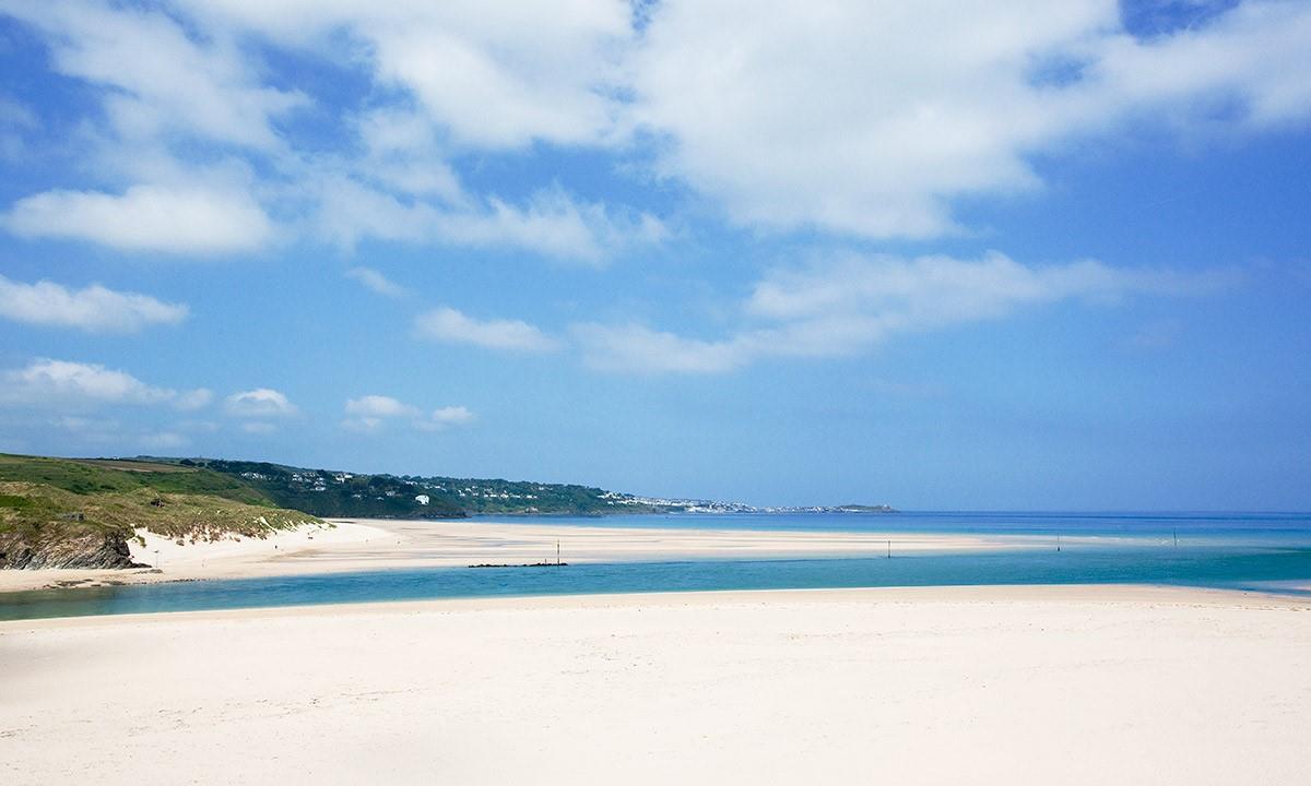 Enjoy lazy days on the beach, paddling in the turquoise waters.
