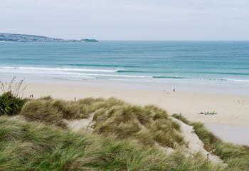 Stroll down to the beautiful sands and rolling dunes nearby!