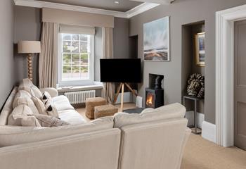 Cosy up in the sitting room with the crackle of the woodburner.