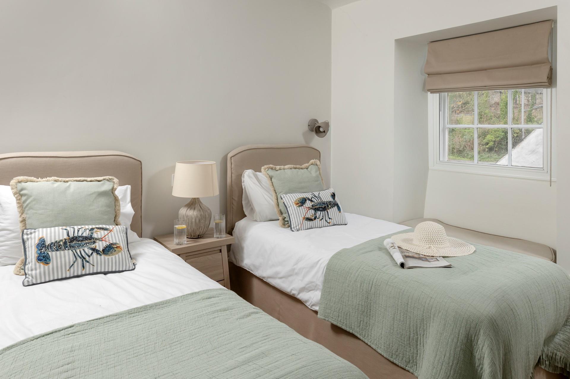 The twin room is ideal for additional guests to relax.