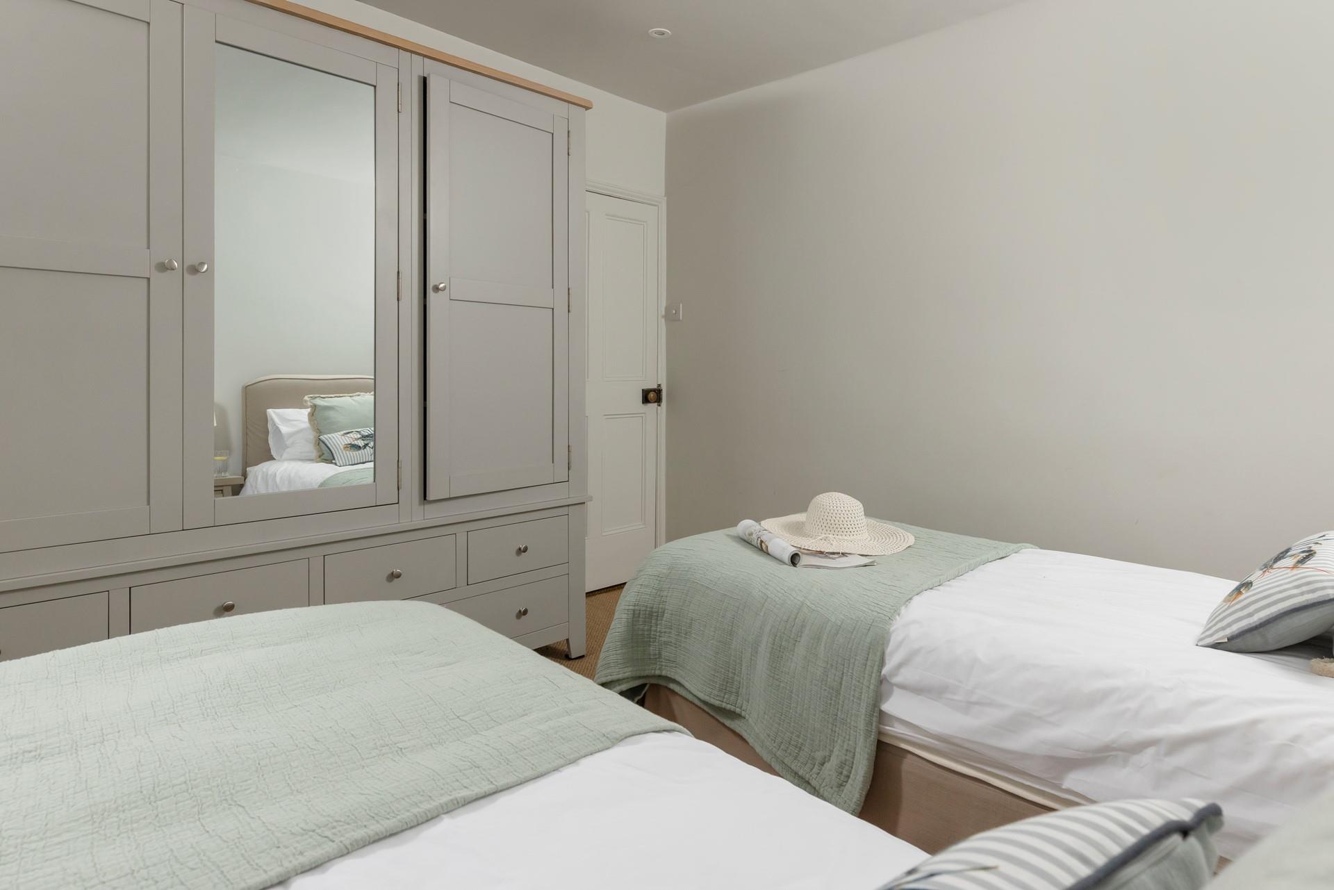 There is a large wardrobe, perfect for all your holiday wear!