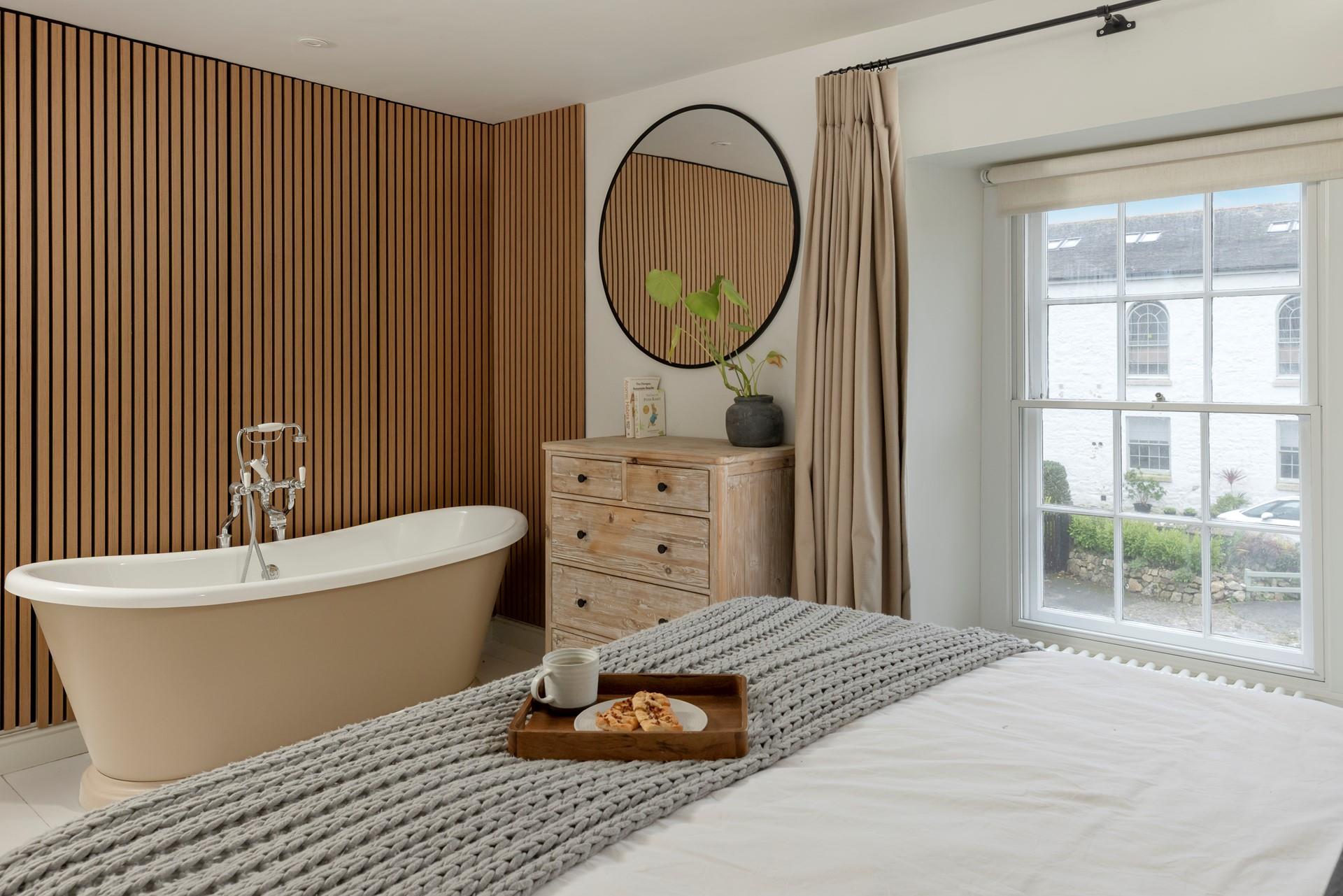 Run a bubble bath to relax and unwind after long coastal strolls.