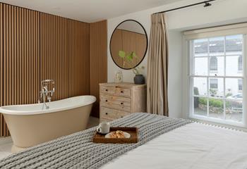 Run a bubble bath to relax and unwind after long coastal strolls.