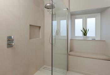The walk in shower room is ideal for getting ready each morning.