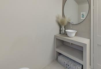 Get ready for the day in the stylish bathrooms.