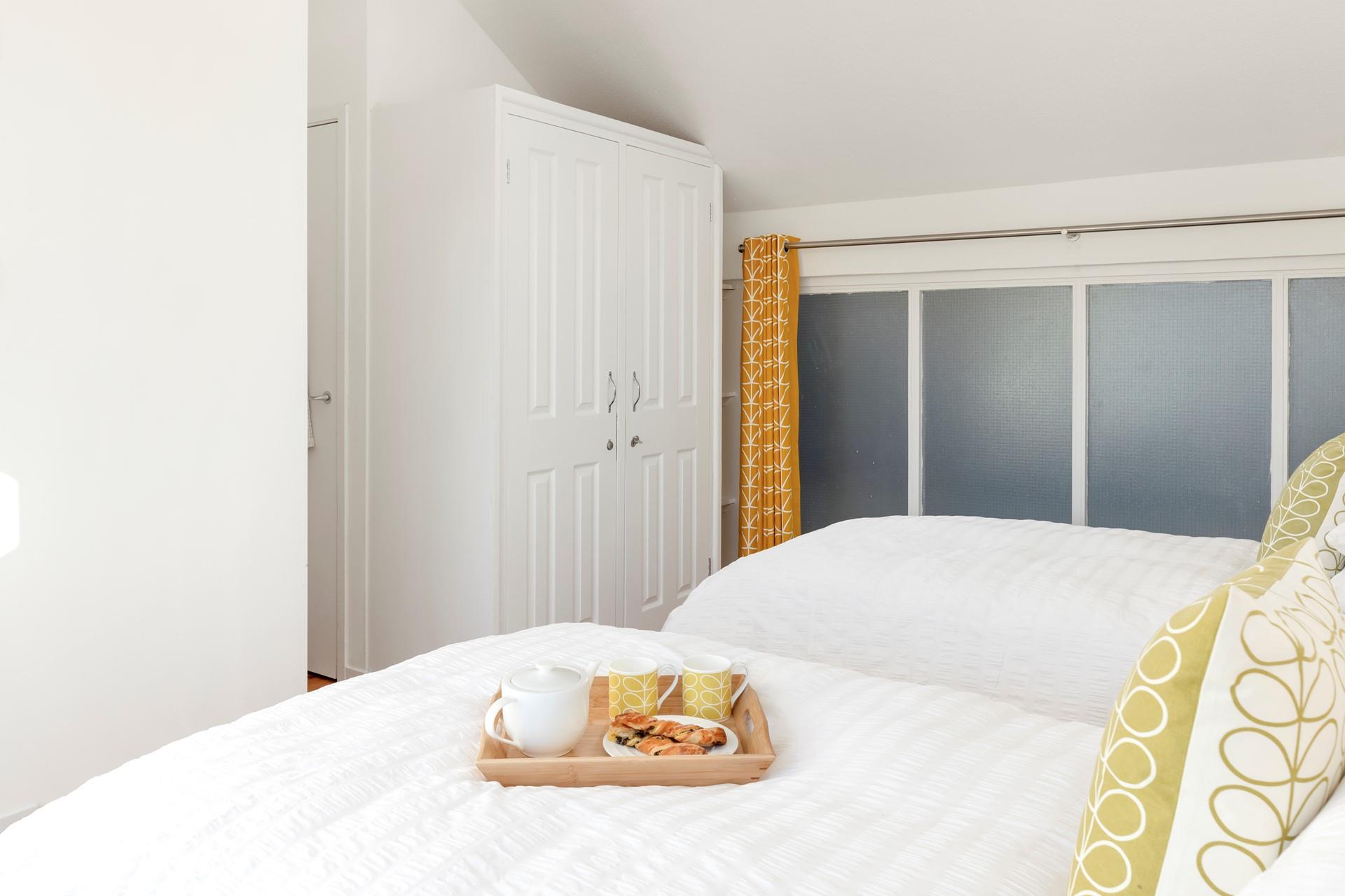 Wake up from a relaxing night's slumber and enjoy tea and pastries.