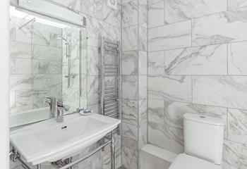 The en suite shower room is ideal for getting ready each morning.