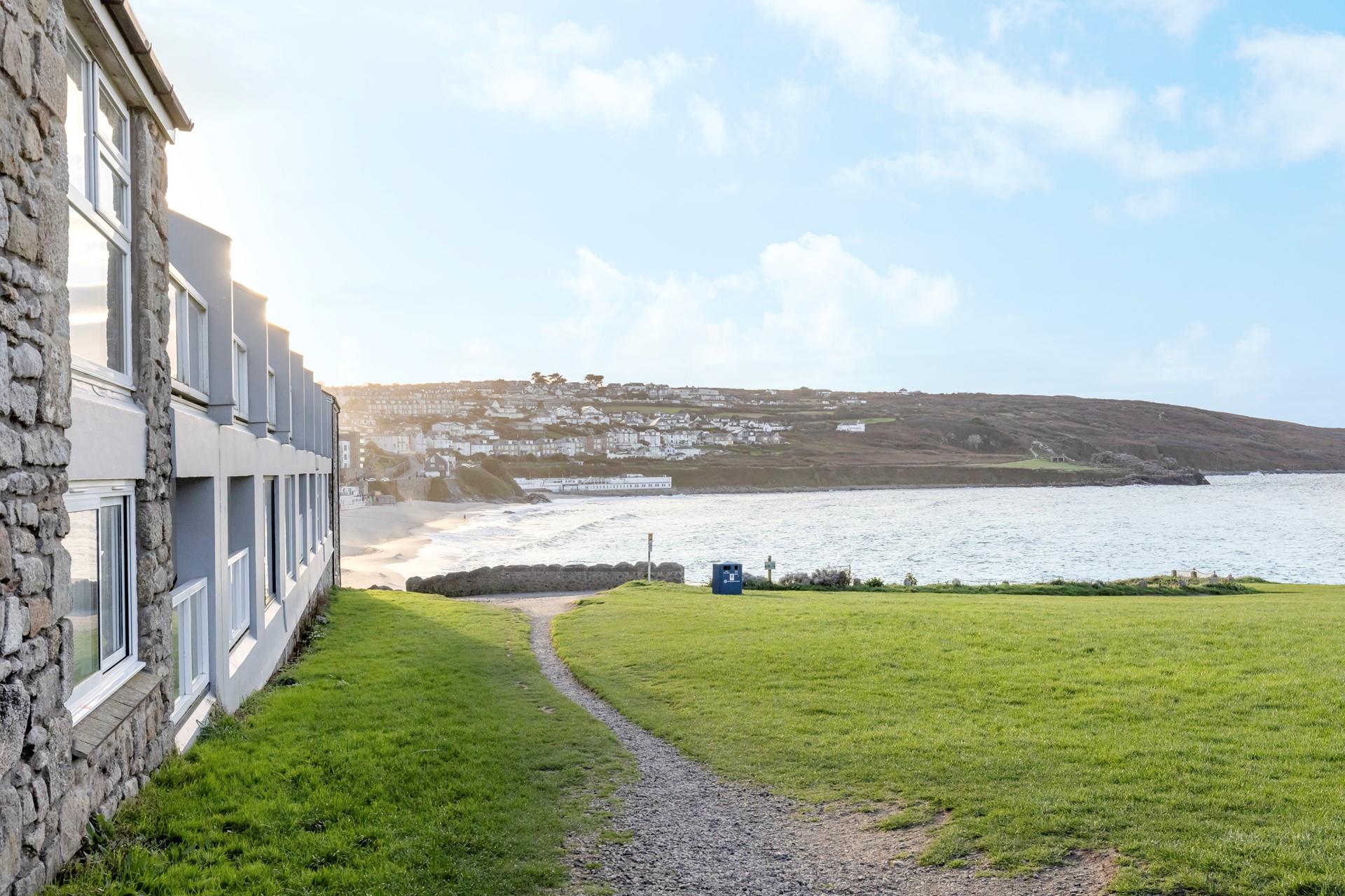 Take a gentle stroll to Porthmeor for a morning dip.