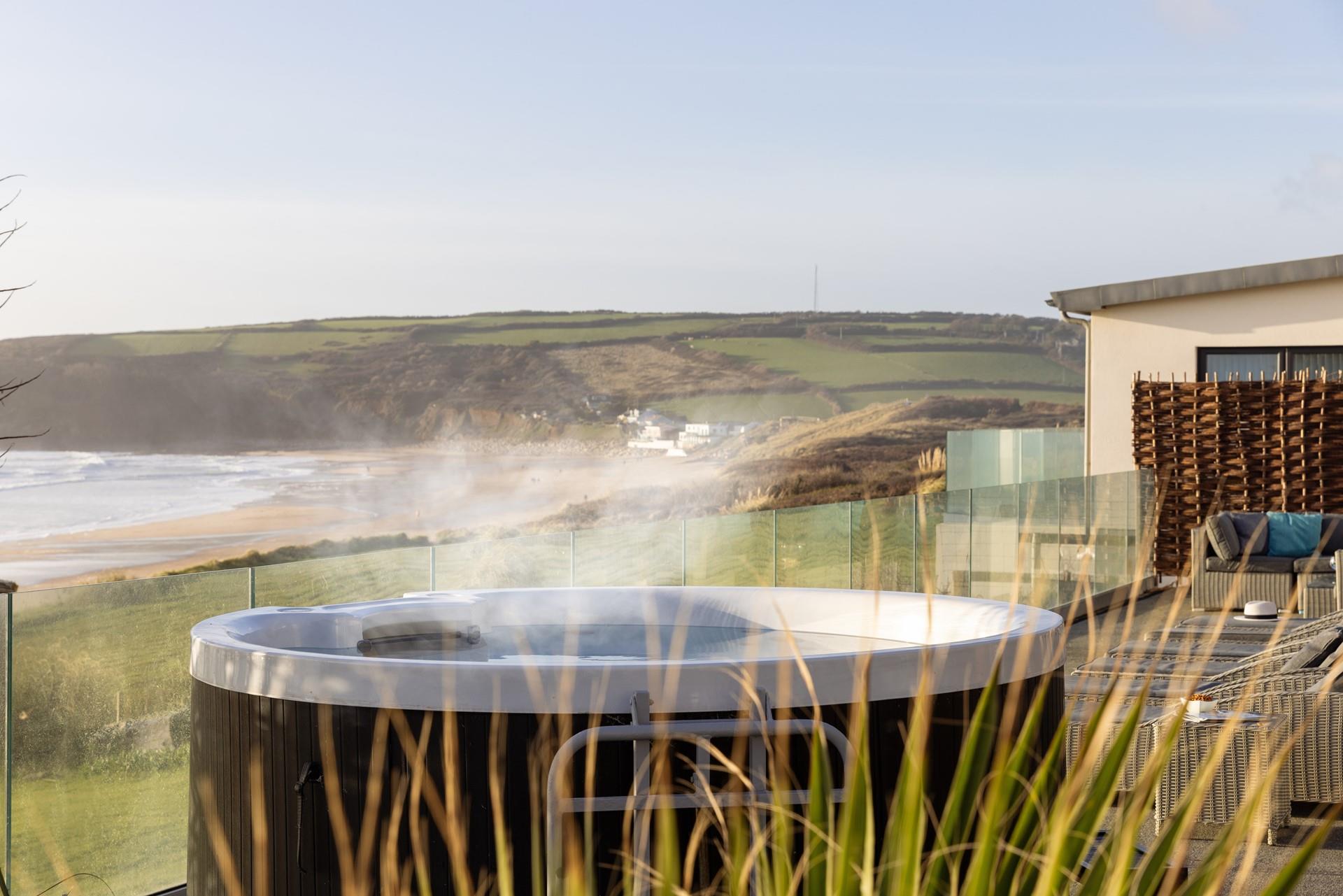 Sink into the steamy hot tub and take in the view.