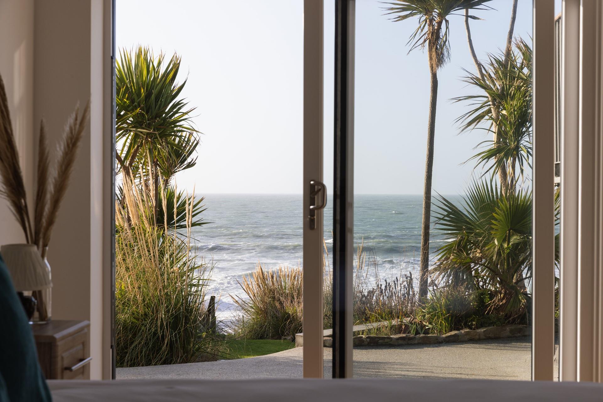 Head outside with a cuppa and soak up the sea views.