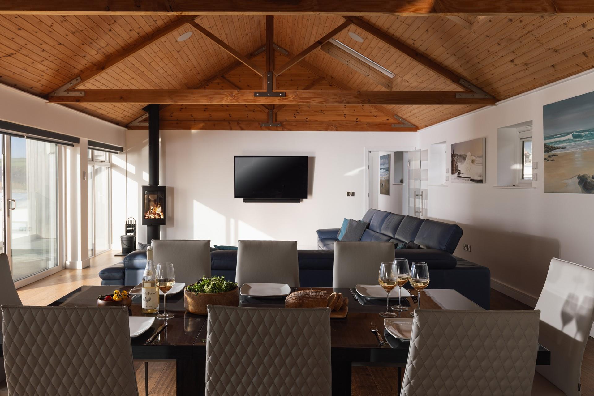 Tuck into a hearty feast around the dining table with a view.