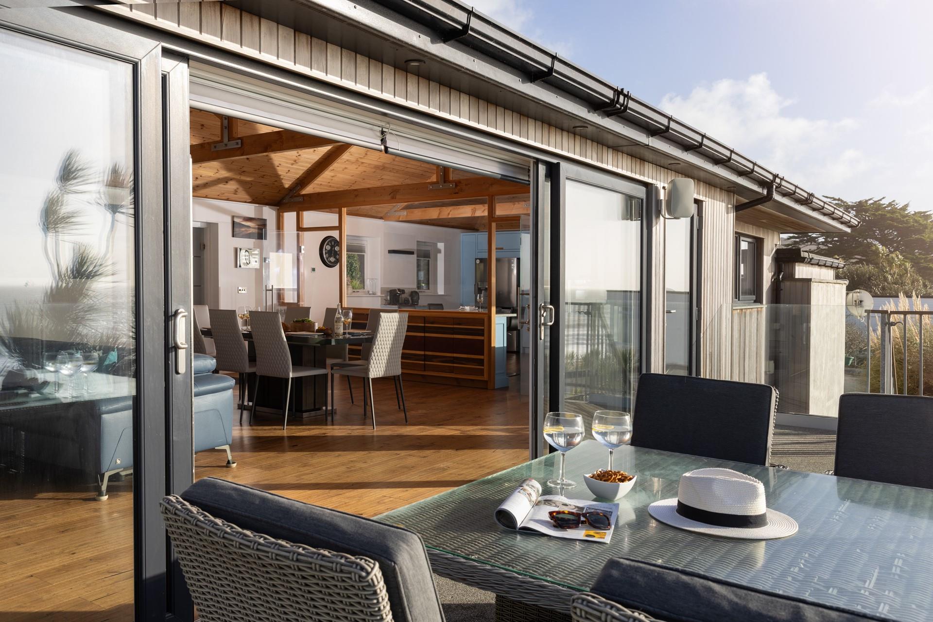 The balcony spans the width of the living space and is the perfect spot for enjoying the view.