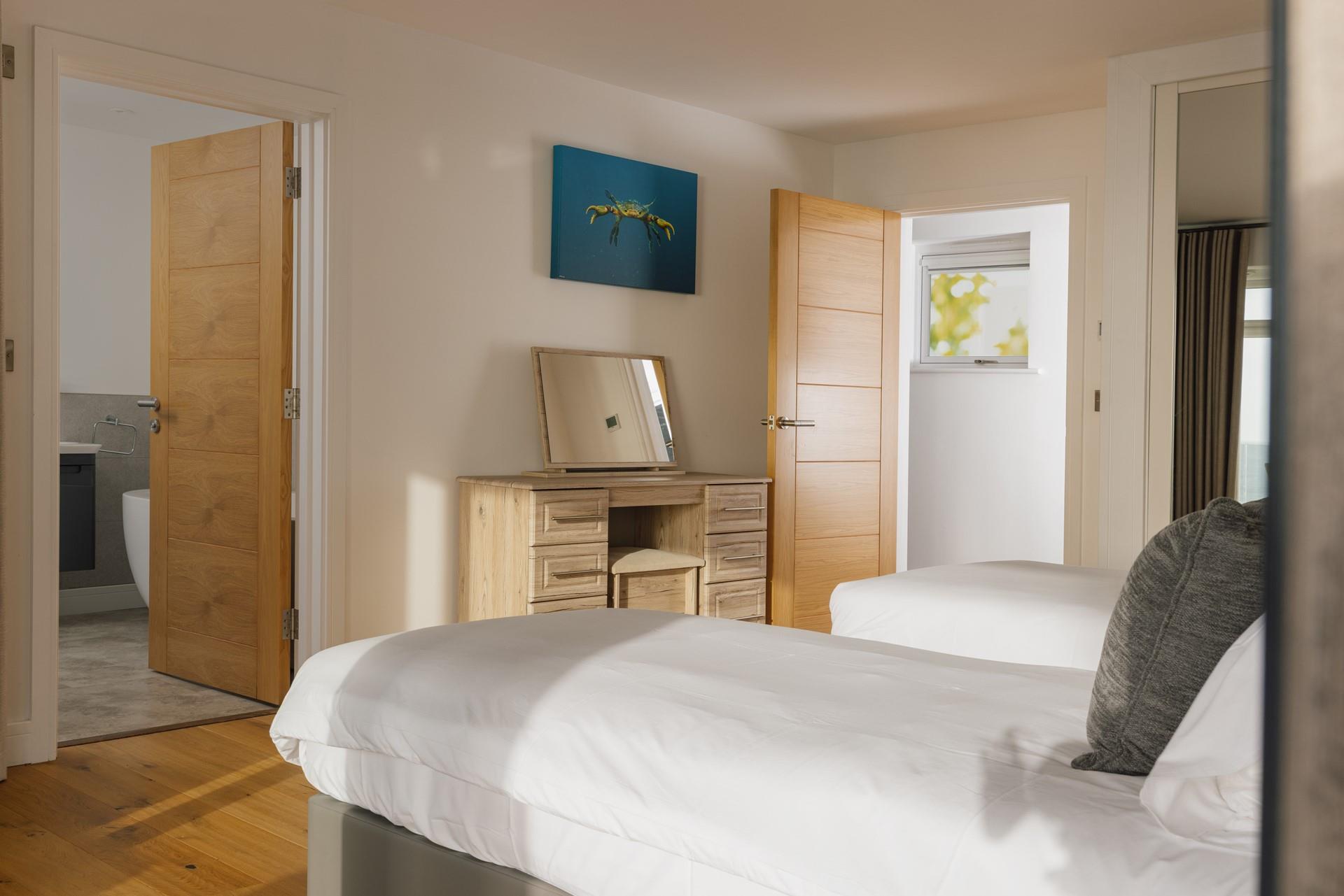 Climb out of bed and get ready in the modern en suite.