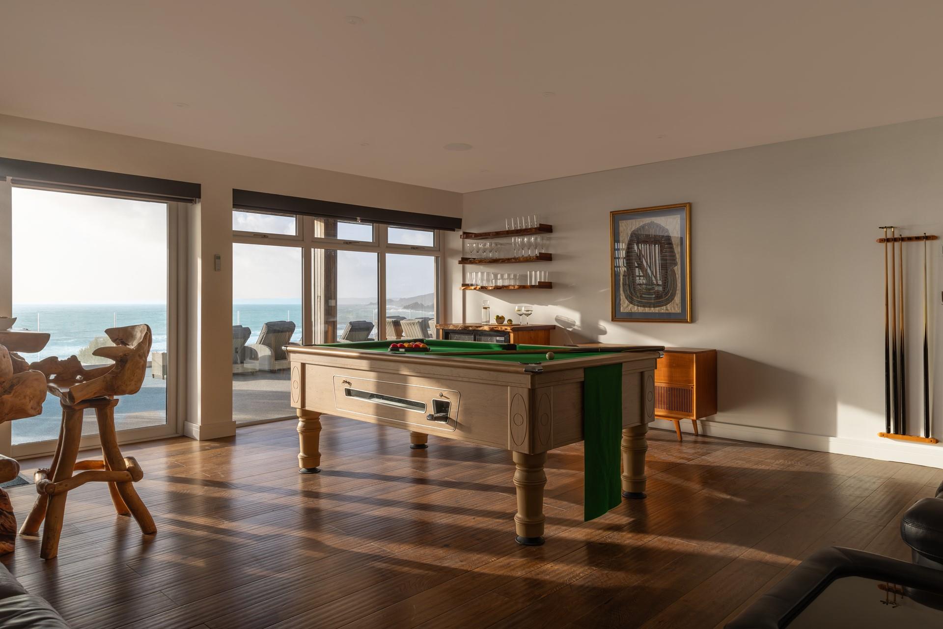 Kids will love the games room featuring a pool table!