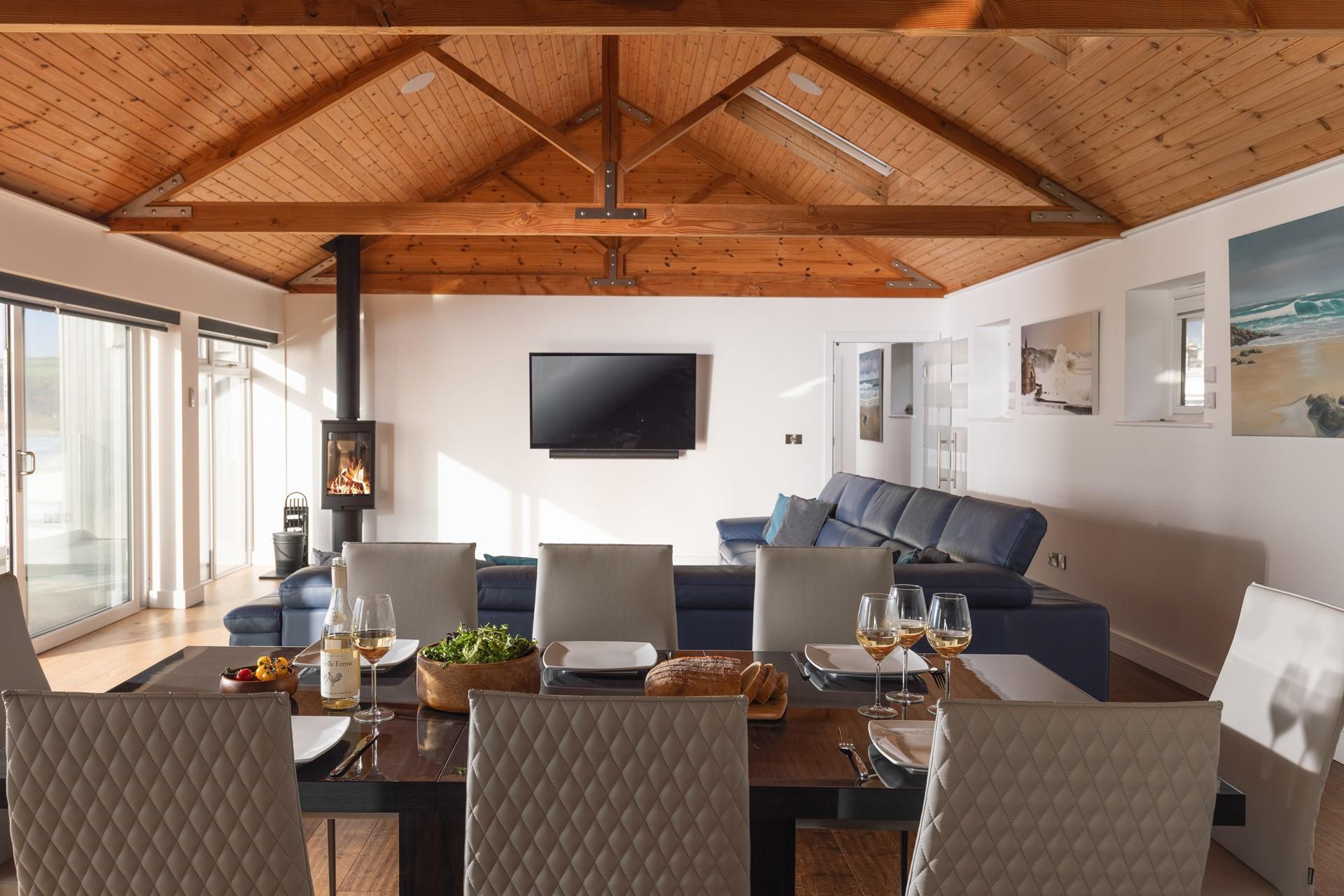 Tuck into a hearty feast around the dining table with a view.