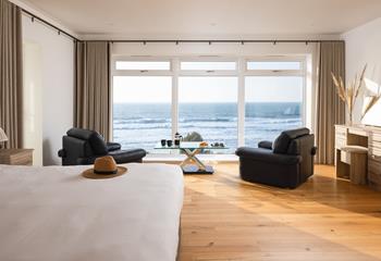 Start the day with coffee and pastries, watching the waves.