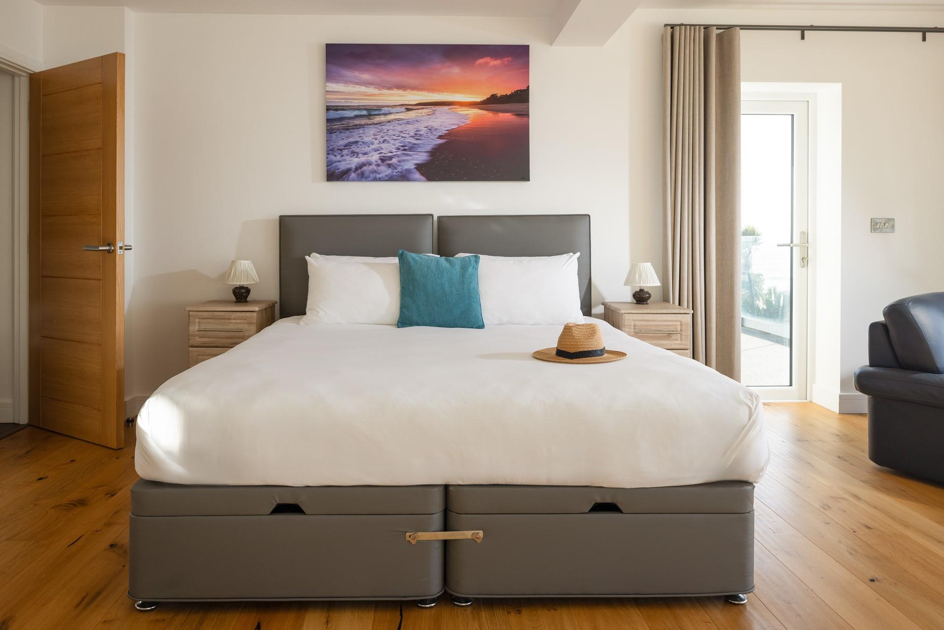 Bedroom 1 also has access to the balcony.