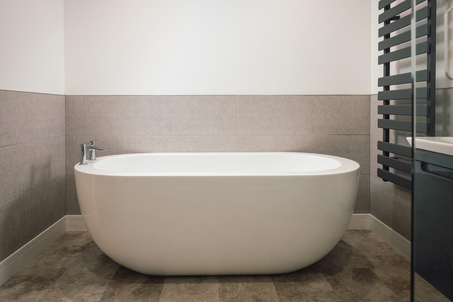 The free-standing bath offers a luxurious place to unwind after long days.