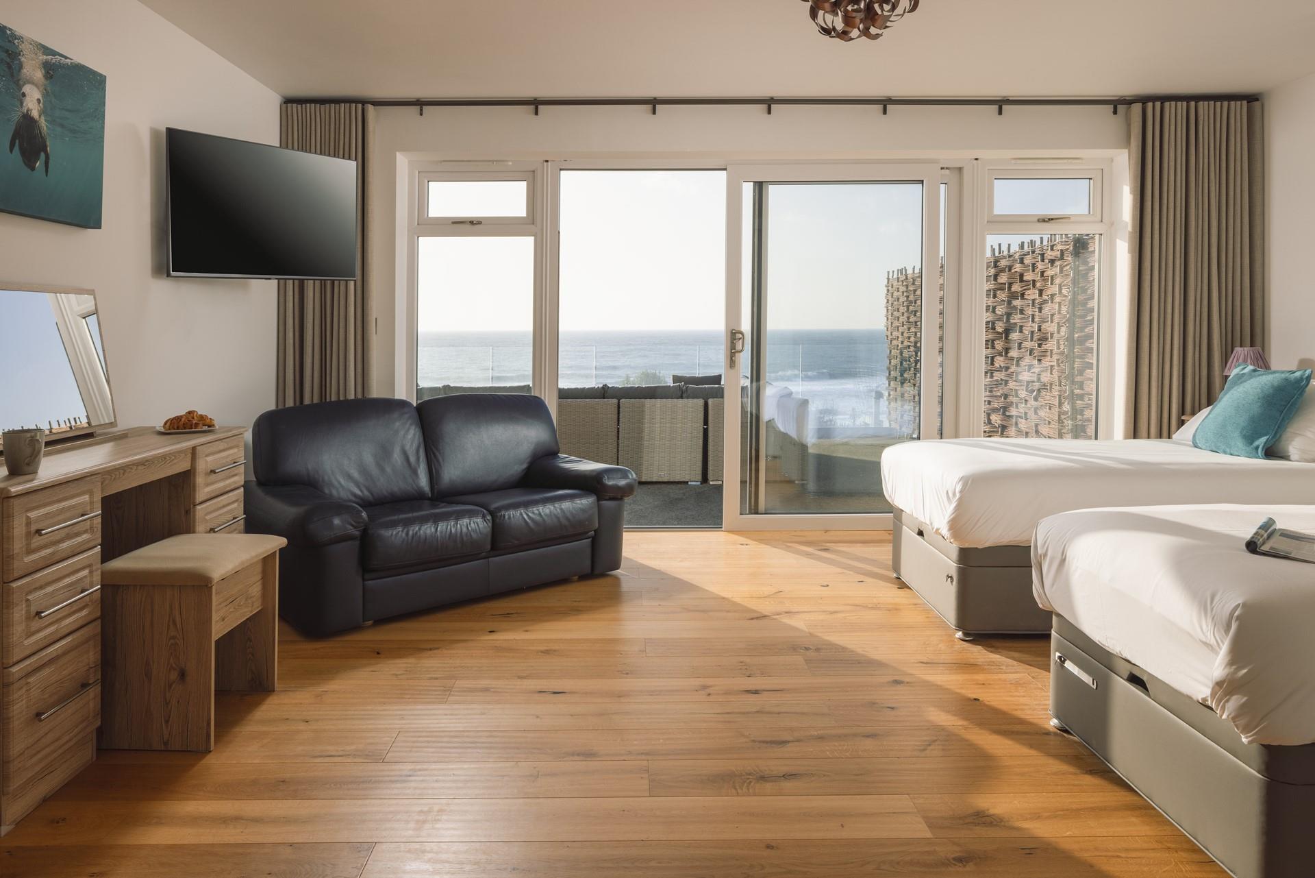 Open the curtains and watch the sunrise over the water each morning.