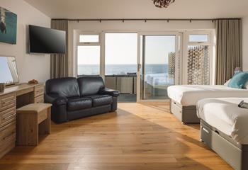 Open the curtains and watch the sunrise over the water each morning.