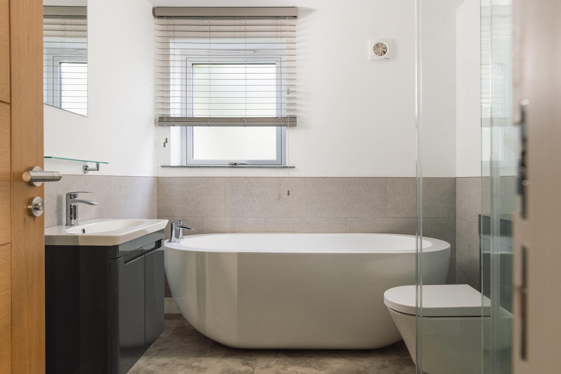 Unwind in a relaxing bubble bath after a coastal path ramble.